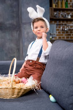 Little boy with Easter eggs clipart