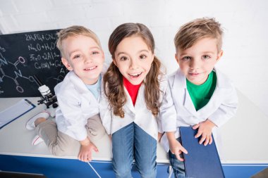 Kids in chemical laboratory  clipart