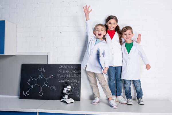 Kids in chemical laboratory