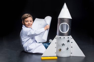 Little boy with rocket clipart