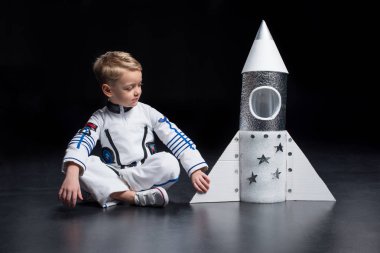 Boy in astronaut costume clipart