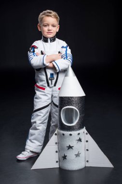 Boy in astronaut costume clipart