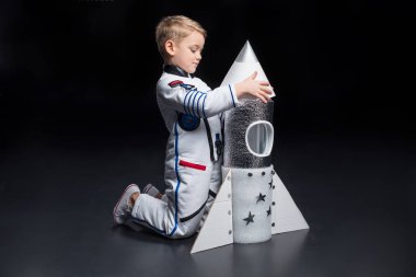 Boy in astronaut costume clipart