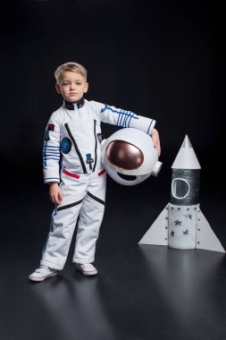 Boy in astronaut costume clipart