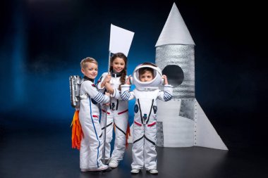 Kids playing astronauts clipart