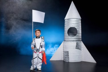 Boy in astronaut costume clipart