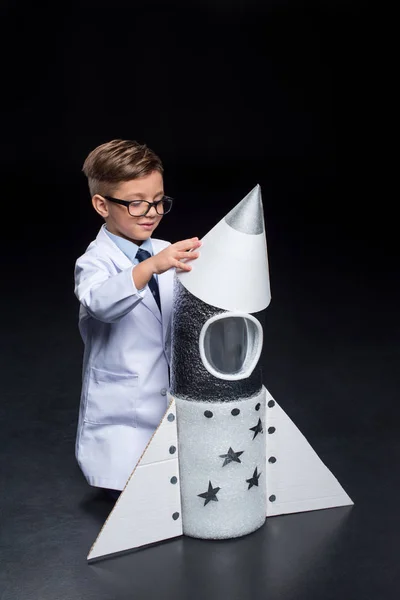 Little boy with rocket — Stock Photo, Image