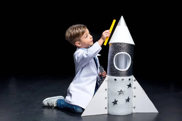 Little boy with rocket — Stock Photo, Image