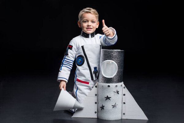 Boy in astronaut costume