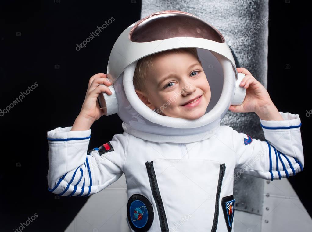 Boy in astronaut costume