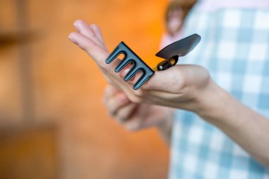 Woman holding garden tools clipart