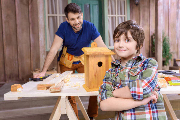 Father and son in workshop