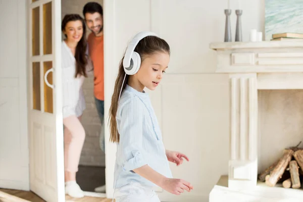 Little girl in headphones — Stock Photo, Image