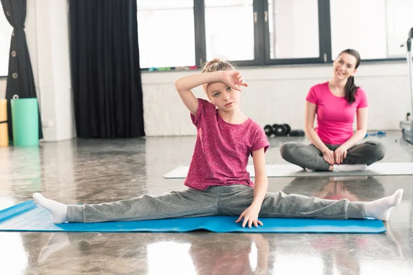 Tired girl stretching — Stock Photo, Image