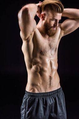 shirtless bodybuilder posing  clipart