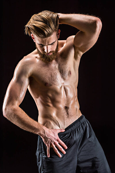 shirtless bodybuilder posing 