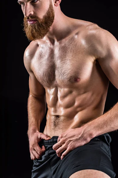 Shirtless bodybuilder poseren — Stockfoto