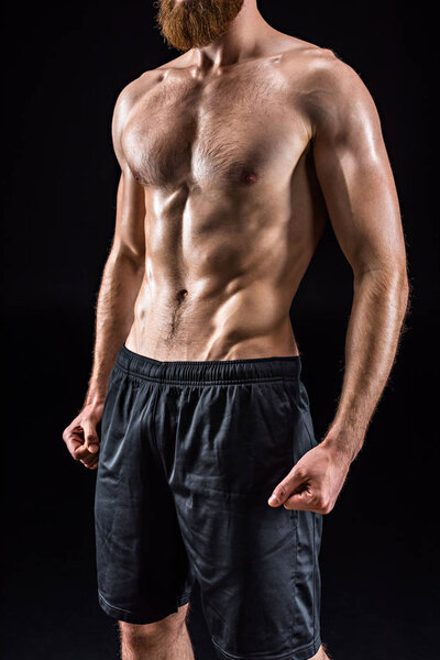 shirtless bodybuilder posing