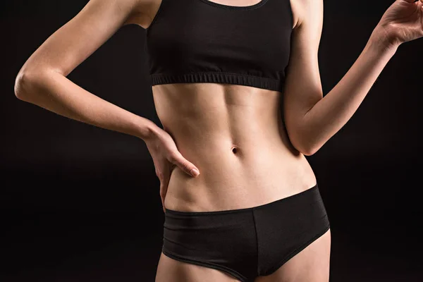 Sportswoman in black underwear — Stock Photo, Image