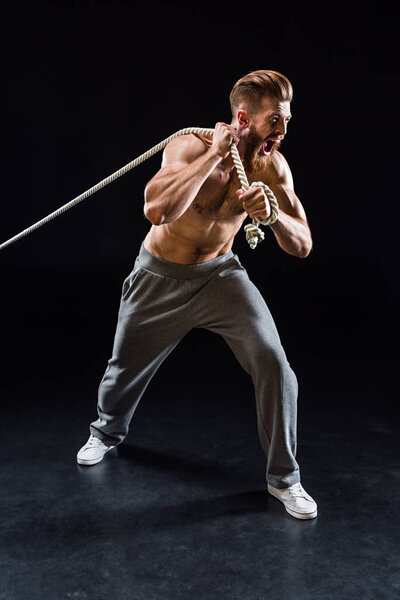 sportsman pulling rope