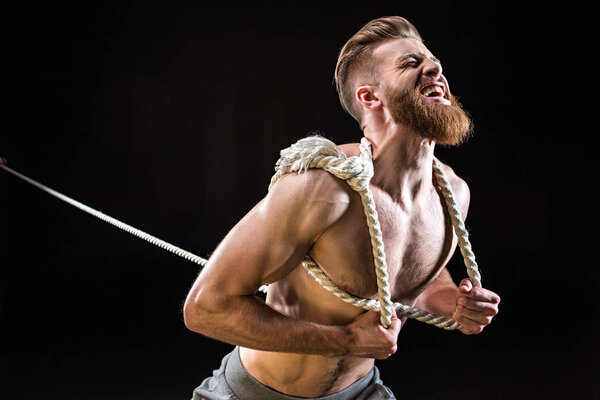 sportsman pulling rope