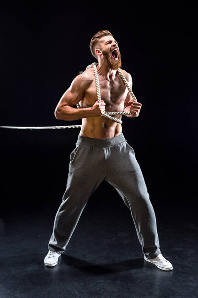 sportsman pulling rope