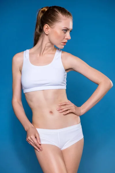 Sportswoman in white underwear — Stock Photo, Image