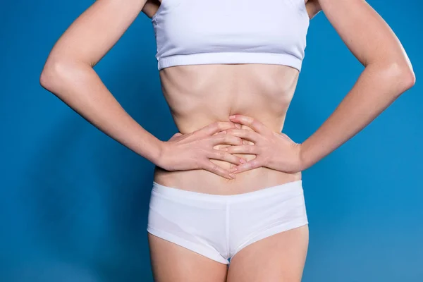 Sportswoman in white underwear — Stock Photo, Image