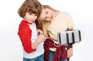 Kids taking selfie with smartphone clipart