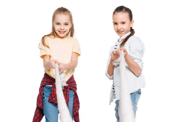 Two girls play tug of war — Stock Photo, Image