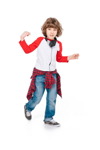 Kid with headphone dancing