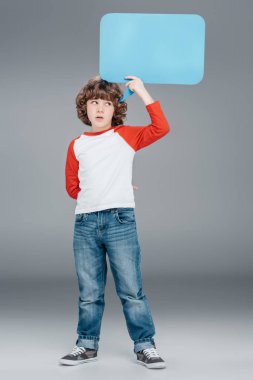 Little boy holding speech bubble clipart