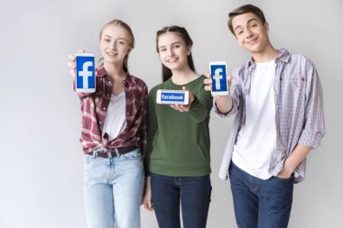 teenage friends with smartphones clipart