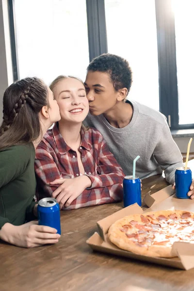 Friends kissing girl — Stock Photo, Image