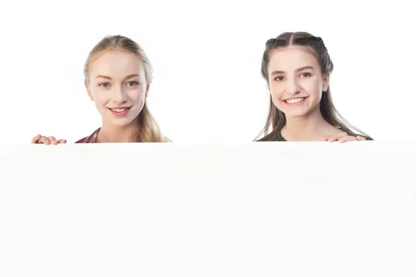 Teenage girls with banner — Stock Photo, Image