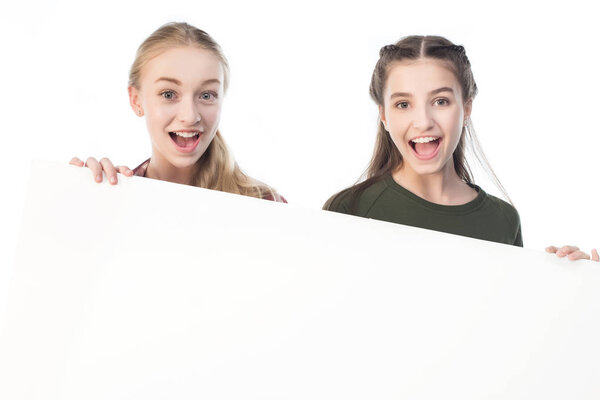 teenage girls with banner