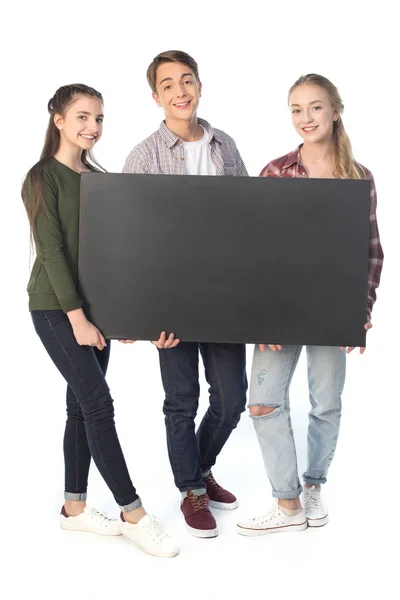 Teenagers with big banner — Stock Photo, Image