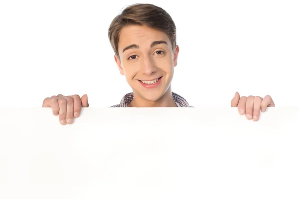 Teenage boy holding banner — Stock Photo, Image
