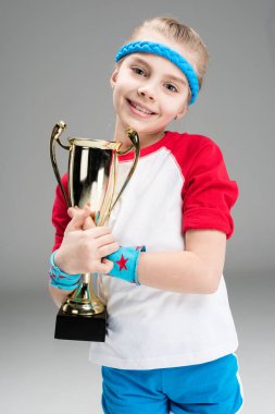 active girl with champion's goblet clipart