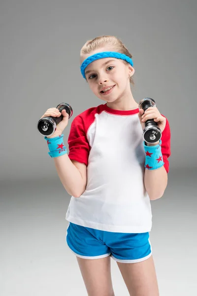 Active girl with dumbbells — Stock Photo, Image