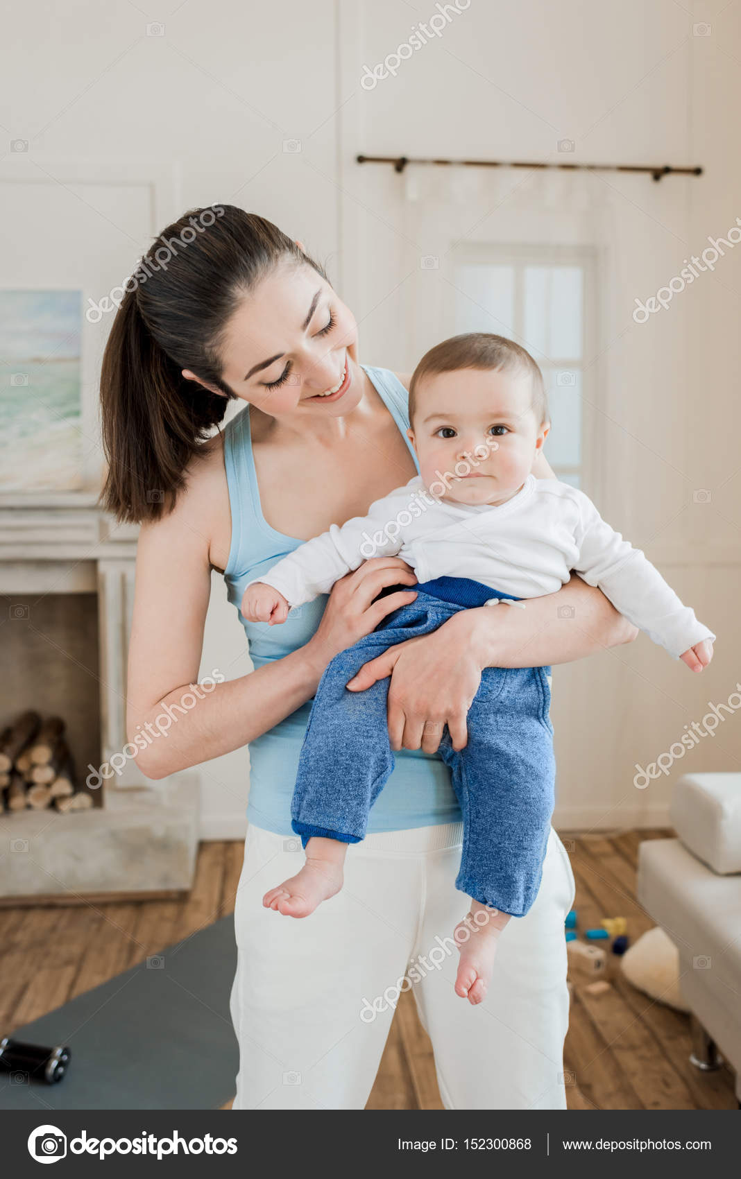 depositphotos_152300868-stock-photo-woman-carrying-baby-child-on.jpg