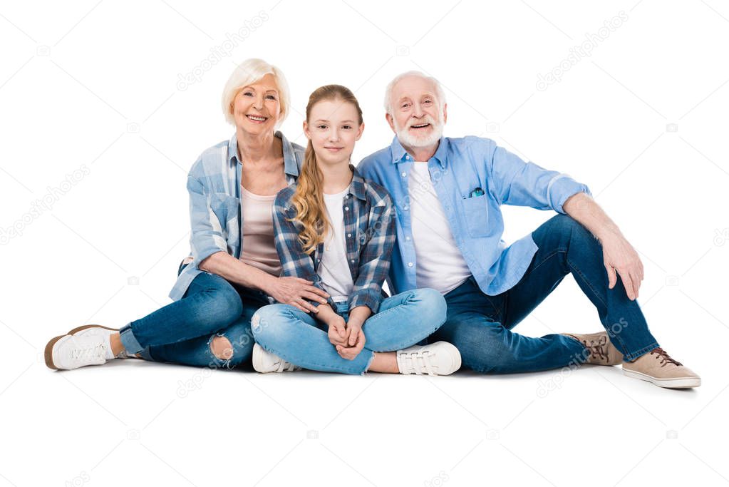 grandfather, grandmother and granddaughter 