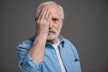senior man reviewing eyesight clipart