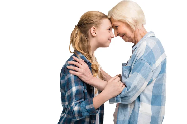 Grandmother and granddaughter hugging — Stock Photo, Image