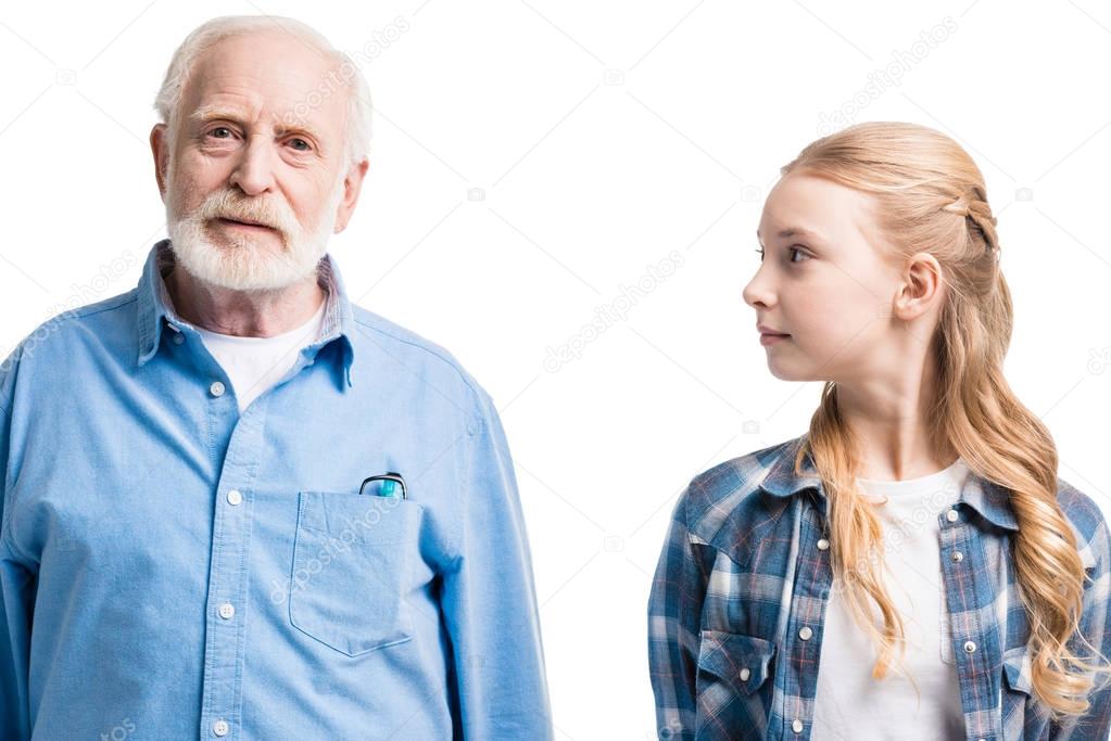 grandfather and granddaughter posing