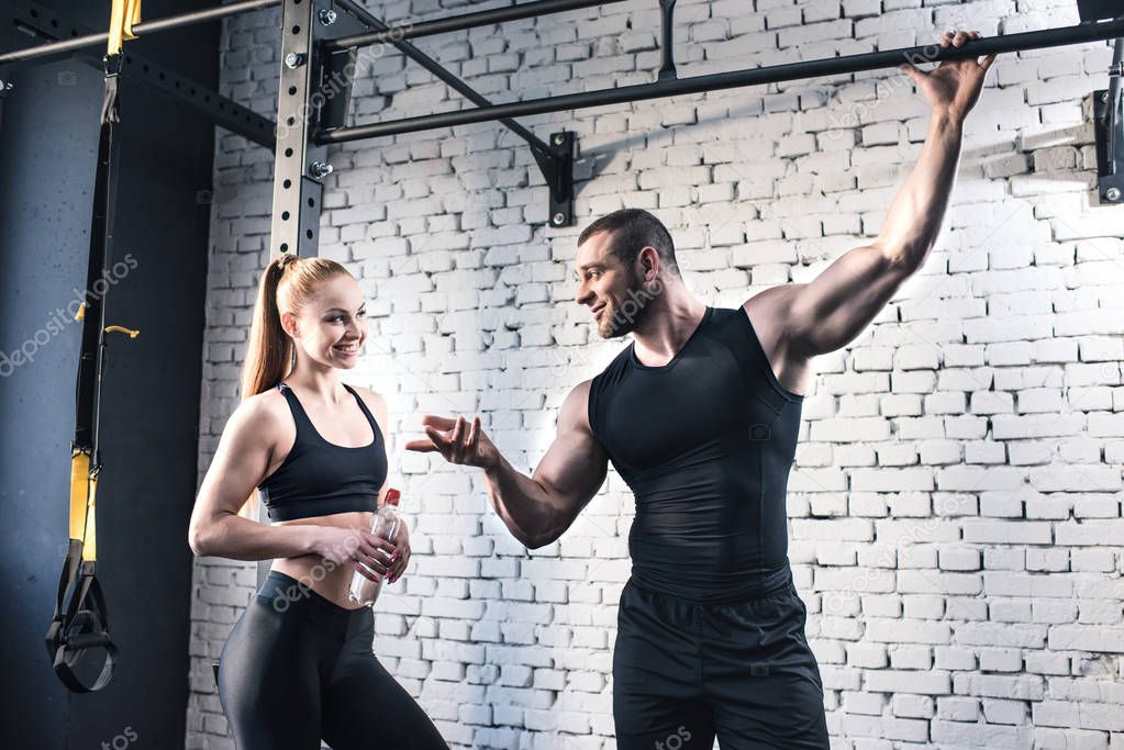 sportsman and sportswoman in gym 4