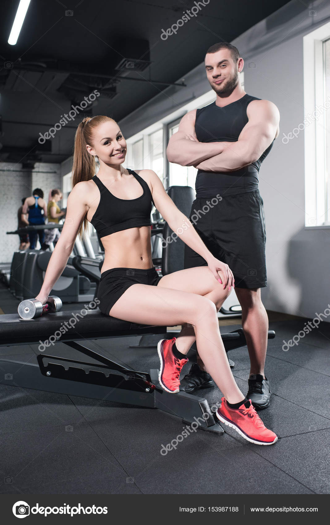 Male Fitness Enthusiast Poses With Dumbbells In Gym Portrait Photo  Background And Picture For Free Download - Pngtree