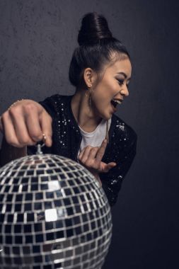 glamour asian girl with disco ball   clipart