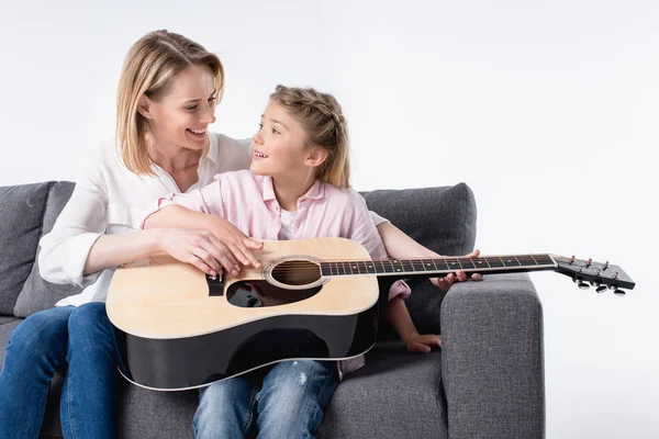 Mother and daughter with guitar — Stock Photo, Image