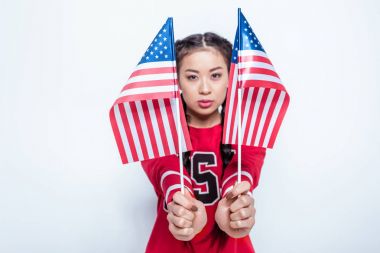 Amerikan bayrakları ile Asyalı kız